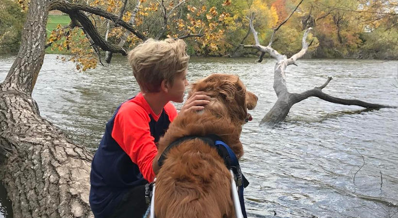 Boy with his disabled dog